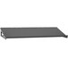 A grey steel slanted shelf for a louvered panel with screws.