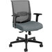 A grey HON Convergence office chair with black mesh back and arms.