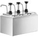 A stainless steel countertop with three ServSense stainless steel condiment dispensers on it.
