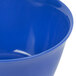 A close up of a Carlisle Ocean Blue melamine bouillon cup.