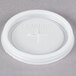 A white plastic lid with the Cambro logo and a cross-shaped slot.