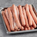 A tray of frozen Nathan's Famous 10" beef franks.
