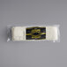 A black and yellow package of Montechevre goat cheese logs with yellow text.