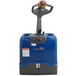 A blue and grey Wesco Industrial Products power pallet truck with a steering wheel and buttons.
