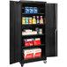 A black metal Hallowell storage cabinet with shelves full of products.