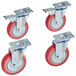 A group of red and blue Wesco caster wheels.