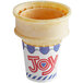 A yellow JOY flat bottom ice cream cone with a hole in it.