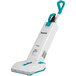 A white and blue Makita cordless upright vacuum cleaner.