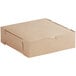 A brown cardboard bakery box with a lid.
