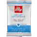 A white and blue package of illy Decaf Classico Coffee with red text.