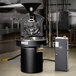 A Giesen W15A commercial coffee roaster with a touchscreen.