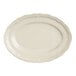 A white oval platter with a scalloped edge.