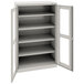 A light gray Tennsco metal storage cabinet with open C-Thru doors.