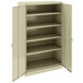 A tan metal Tennsco storage cabinet with solid doors.