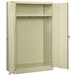 A putty metal Tennsco wardrobe cabinet with solid doors open.