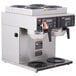 A Bunn Axiom Twin Automatic Coffee Brewer with 4 Upper and 2 Lower Warmers on a counter.