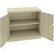 A beige Tennsco standard storage cabinet with solid doors open.