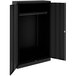 A black metal Tennsco wardrobe cabinet with open doors.