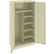 A white metal Tennsco combination cabinet with shelves.