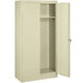 A white metal Tennsco wardrobe cabinet with solid doors open.