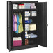A black Tennsco jumbo combination cabinet with shelves and items on it.