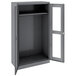 A dark gray metal Tennsco wardrobe cabinet with open C-thru doors.