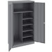 A dark gray steel Tennsco combination cabinet with solid doors.