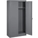A dark grey metal Tennsco wardrobe cabinet with solid doors.