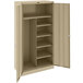 A tan metal Tennsco combination cabinet with shelves and solid doors.