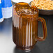 Choice 60 oz. Amber SAN Plastic Beverage Pitcher with 3 Spouts Main Thumbnail 1