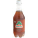 A Jarritos Tamarind Soda bottle with brown liquid and a brown label.