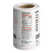 A roll of white paper food labels with a Tractor Mandarin & Cardamom label on it.