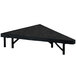 A black triangular National Public Seating stage pie unit with legs and a black top.