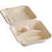 A World Centric white compostable fiber clamshell container with three compartments.