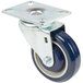 A set of four blue Lavex swivel plate casters with blue and white wheels.