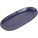 An oval blue Elite Global Solutions melamine plate with a blue and white stripe design.