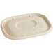 A World Centric compostable fiber lid for a white rectangular container with text on it.