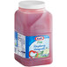 A plastic jug of red Kraft Fat-Free Raspberry Vinaigrette.