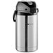 A stainless steel Bunn coffee container with a black lid.