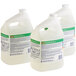 Three white jugs of Comet Disinfecting Bathroom Cleaner with green labels.