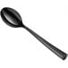A black Visions plastic tasting spoon with a handle.