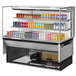 A Turbo Air refrigerated display case with beverages on shelves.