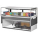 A Turbo Air 60" white drop-in refrigerated display case with cans of soda on a counter.
