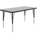 A Correll rectangular activity table with black legs and a gray top.