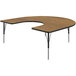 A Correll medium oak horseshoe-shaped activity table with adjustable height legs.