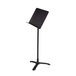 A black National Public Seating Melody music stand with a black rectangular object on it.