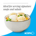 A gray matte stoneware bowl with a smooth finish, ideal for serving soups and salads.