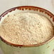 A bowl of McCormick Roasted Garlic Bread Seasoning.