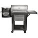 A black and silver Louisiana Grills LG800FL Founders Legacy 800 Pellet grill with a stainless steel tray.