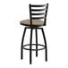 A black Lancaster Table & Seating bar stool with a taupe cushion.